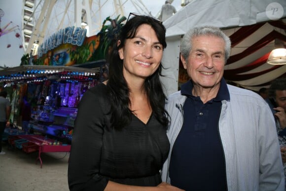 Claude Lelouch et sa compagne Valérie Perrin - Inauguration de la Fête des Tuileries à Paris le 26 juin 2015.