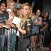 Hilary Duff change de tenue entre son arrivée et sa sortie du plateau de l'émission Good Morning America à New York, le 16 juin 2015. 