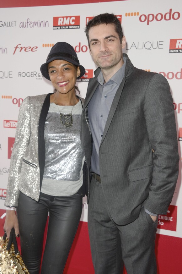 Gil Alma et sa compagne Aminata - Le 94e Prix d'Amérique Opodo à l'Hippodrome de Paris-Vincennes, le 25 janvier 2015.
