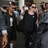 Brad Pitt et Angelina Jolie arrivent avec leurs enfants Maddox, Pax, Zahara, Shiloh, Vivienne et Knox à l'aéroport de LAX à Los Angeles, le 5 juillet 2015 