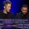Cyril Hanouna et Jean-Luc Lemoine, dans Qui veut gagner des millions ? sur TF1, le samedi 25 juillet 2015.