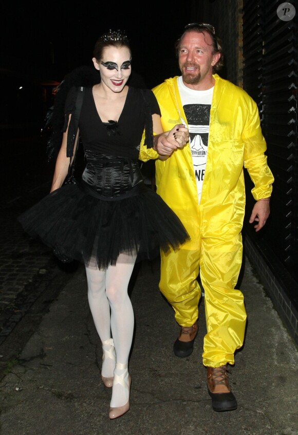 Guy Ritchie et Jacqui Ainsley à la sortie du club "firehouse" à Londres, le 30 octobre 2014.