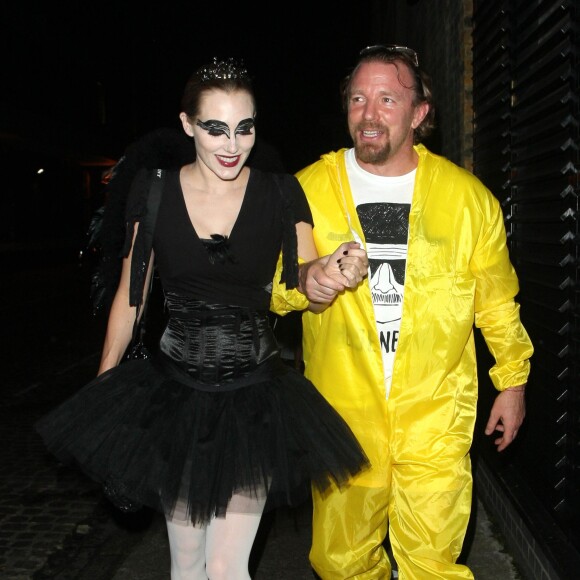 Guy Ritchie et Jacqui Ainsley à la sortie du club "firehouse" à Londres, le 30 octobre 2014.