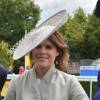 La princesse Eugenie d'York, accompagnée par son amoureux Jack Brooksbank, participait au Ladies' Day de l'événement hippique Glorious Goodwood le 30 juillet 2015 à Midhurst, où elle a remis le trophée de la Magnolia Cup.