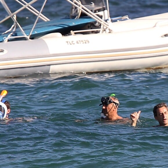 Nicolas Sarkozy et son fils Louis au Cap Nègre le 5 juillet 2014