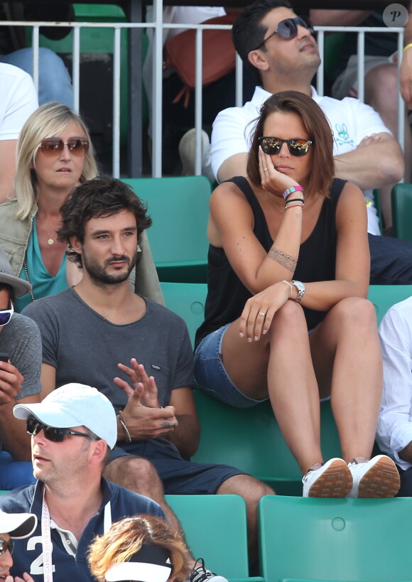 Laure Manaudou et son compagnon Jérémy Frérot dans les tribunes de Roland-Garros à Paris, le 7 juin 2015