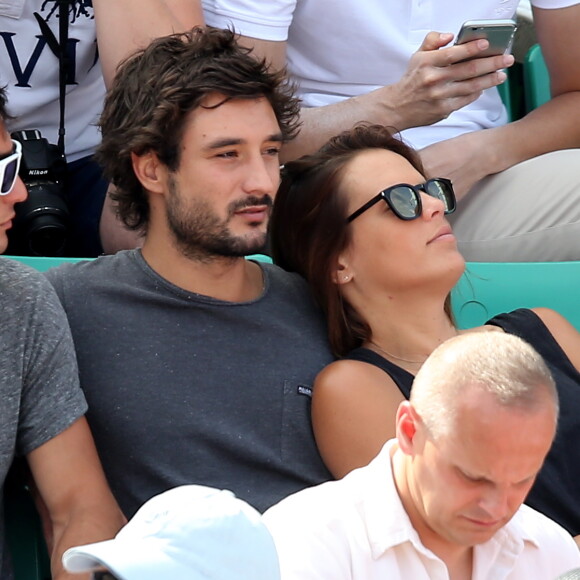 Laure Manaudou et son compagnon Jérémy Frérot dans les tribunes de Roland-Garros à Paris, le 7 juin 2015