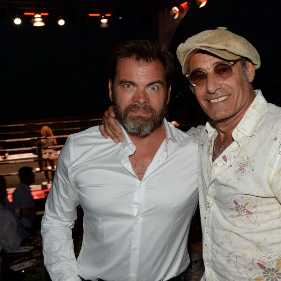 Semi-Exclusif - Clovis Cornillac et Gérard Lanvin lors de la troisième édition de la soirée "Fight Night" à Saint-Tropez au coeur de La Citadelle, le 4 août 2015