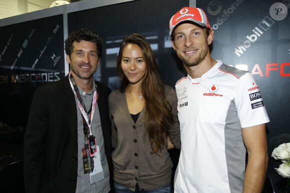 Patrick Dempsey, Jessica Michibata et Jenson Button lors du Grand Prix des Etats-Unis à Austin au Texas le 17 novembre 2012