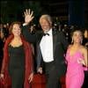 Morgan Freeman pose avec E'Dena Hines, la petite-fille de sa première femme (Jeanette Adair Bradshaw). Cette dernière a été retrouvée morte devant son appartement à New York, très tôt le dimanche le 16 août 2015. La jeune femme de 33 ans a été poignardée à mort par Lamar Davenport, son compagnon. Sur la photo à gauche, l'ex-femme de Morgan Freeman, Myrna Colley-Lee. Image du 18 mai 2005, montée des marches du film "Sin City", lors du 58ème festival international du film de Cannes. 