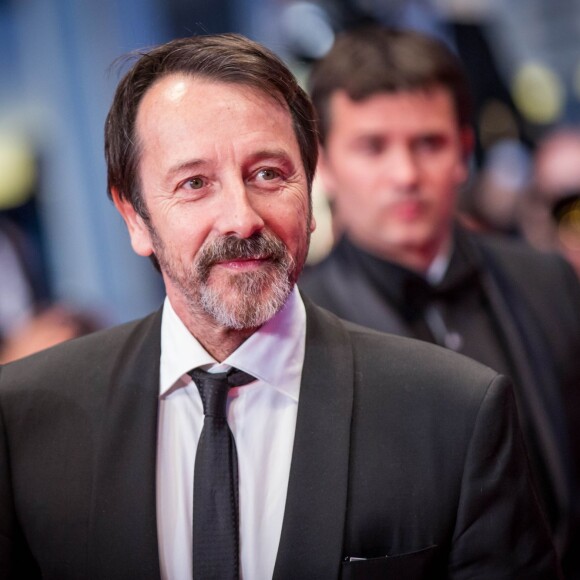 L'acteur Jean-Hugues Anglade - Montée des marches du film "Shan He Gu Ren" (Mountains May Depart) lors du 68e Festival International du Film de Cannes, à Cannes le 20 mai 2015.