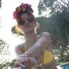 Rihanna en vacances à la Barbade, affole la Toile avec son bikini jaune Charlie by MZ (Matthew Zink). Août 2015.