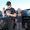 Carrie Underwood et son mari Mike Fisher arrivent a l'aeroport de Los Angeles, le 19 novembre 2012. 