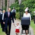 Le prince William et la duchesse Catherine de Cambridge, avec leur fils le prince George, faisaient baptiser leur fille la princesse Charlotte le 5 juillet 2015 à Sandringham.