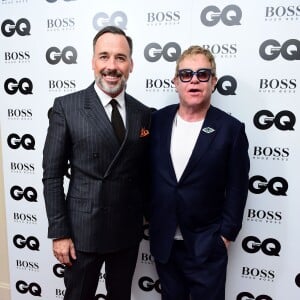 Elton John et David Furnish lors de la cérémonie des 2015 GQ Men of the Year Awards à la Royal Opera House de Londres, le 8 septembre 2015