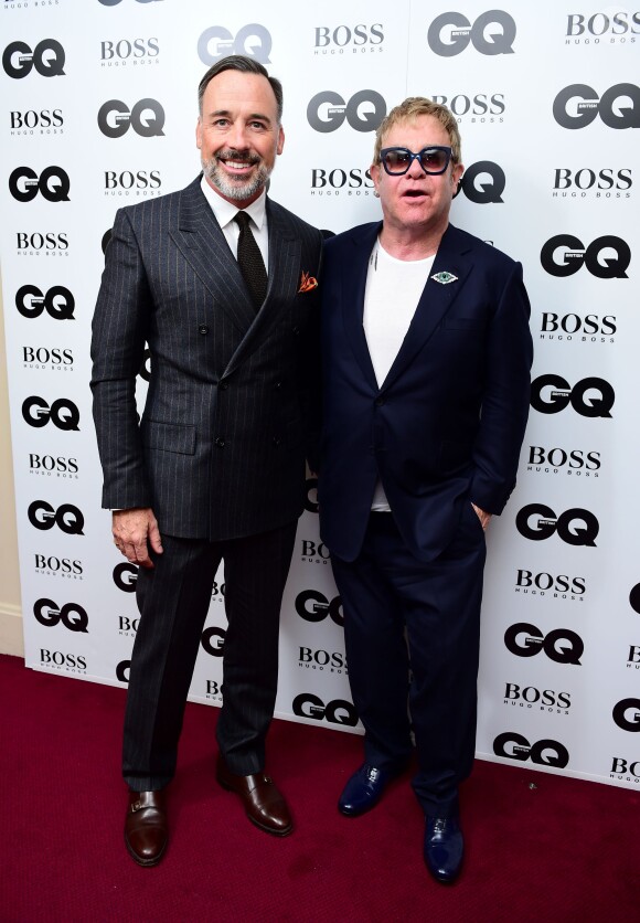 Elton John et David Furnish lors de la cérémonie des 2015 GQ Men of the Year Awards à la Royal Opera House de Londres, le 8 septembre 2015