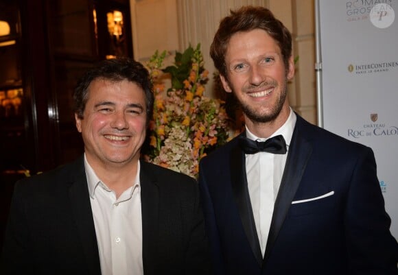 Patrick Pelloux, Romain Grosjean lors du gala de charité au profit de l'association "Enfance et Cancer" à l'hôtel InterContinental de Paris, le 9 septembre 2015