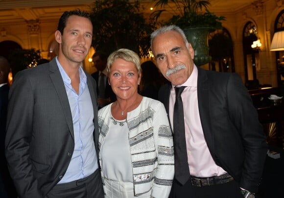 Michaël Llodra, Mansour Bahrami et sa femme Véronique lors du gala de charité au profit de l'association "Enfance et Cancer" à l'hôtel InterContinental de Paris, le 9 septembre 2015