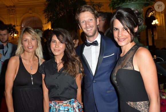 Nikita Lespinasse, Reem Kherici, Romain Grosjean et sa femme Marion Jollès lors du gala de charité au profit de l'association "Enfance et Cancer" à l'hôtel InterContinental de Paris, le 9 septembre 2015