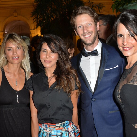 Nikita Lespinasse, Reem Kherici, Romain Grosjean et sa femme Marion Jollès lors du gala de charité au profit de l'association "Enfance et Cancer" à l'hôtel InterContinental de Paris, le 9 septembre 2015