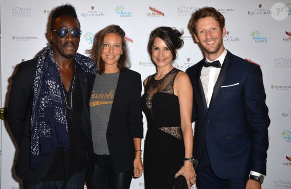 Marco Prince et sa compagne Alice, Romain Grosjean et sa femme Marion Jollès lors du gala de charité au profit de l'association "Enfance et Cancer" à l'hôtel InterContinental de Paris, le 9 septembre 2015