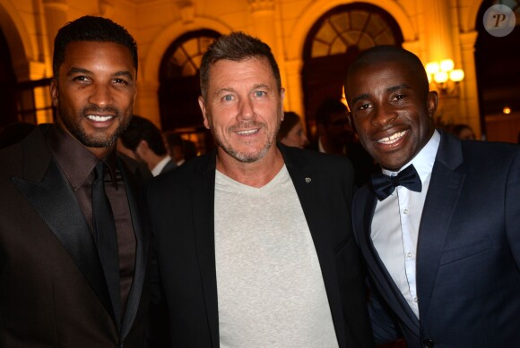 Habib Beye, Pascal Olmeta, Rio Mavuba lors du gala de charité au profit de l'association "Enfance et Cancer" à l'hôtel InterContinental de Paris, le 9 septembre 2015