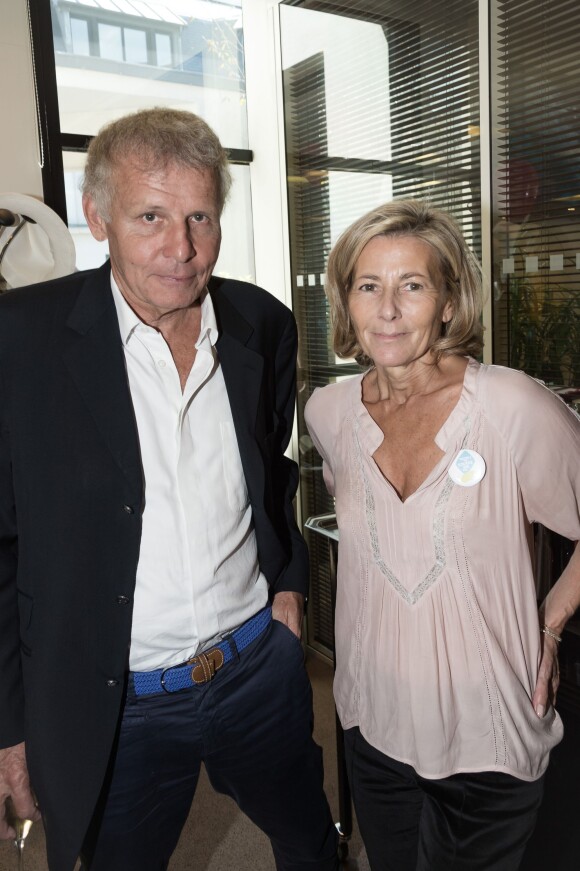 Les journalistes Patrick Poivre d'Arvor et Claire Chazal, à la 11e édition du "BGC Charity Day" à Paris le 11 septembre 2015.