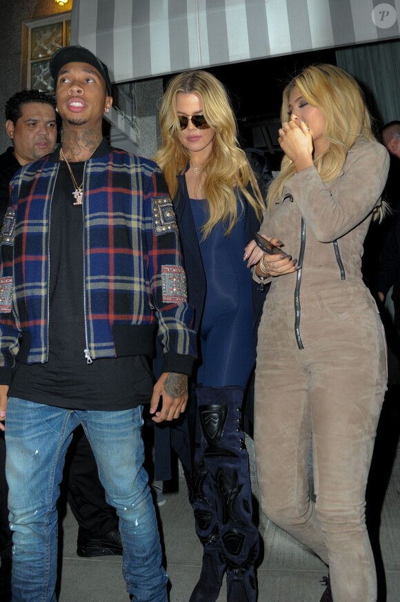 Tyga avec les soeurs Kardashian et Jenner au restaurant italien Il Mulino, à New York le 13 septembre 2015.