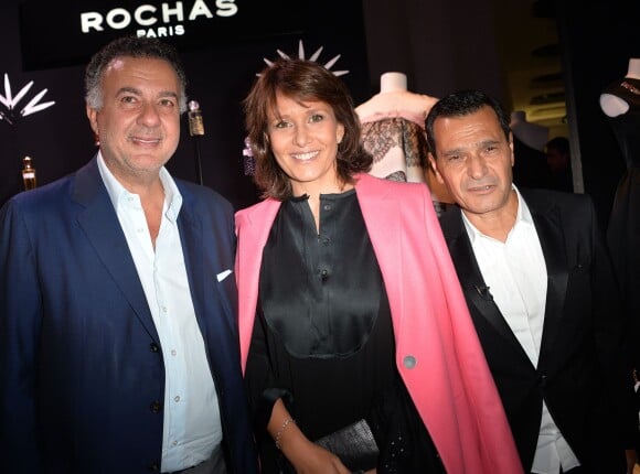 Philippe Bénacin (PDG d'Interparfums), Carole Rousseau et Jean Madar (Directeur général de Inter Parfums) - Photocall de la soirée pour les 90 ans de la marque " Rochas" à Paris le 30 septembre 2015.