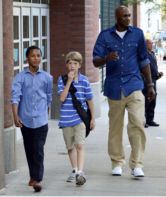 Lamar Odom et son fils Lamar Jr. à New York en juin 2012. Il est aussi le père d'une fille, Destiny, qui fêtait ce jour-là son bac.