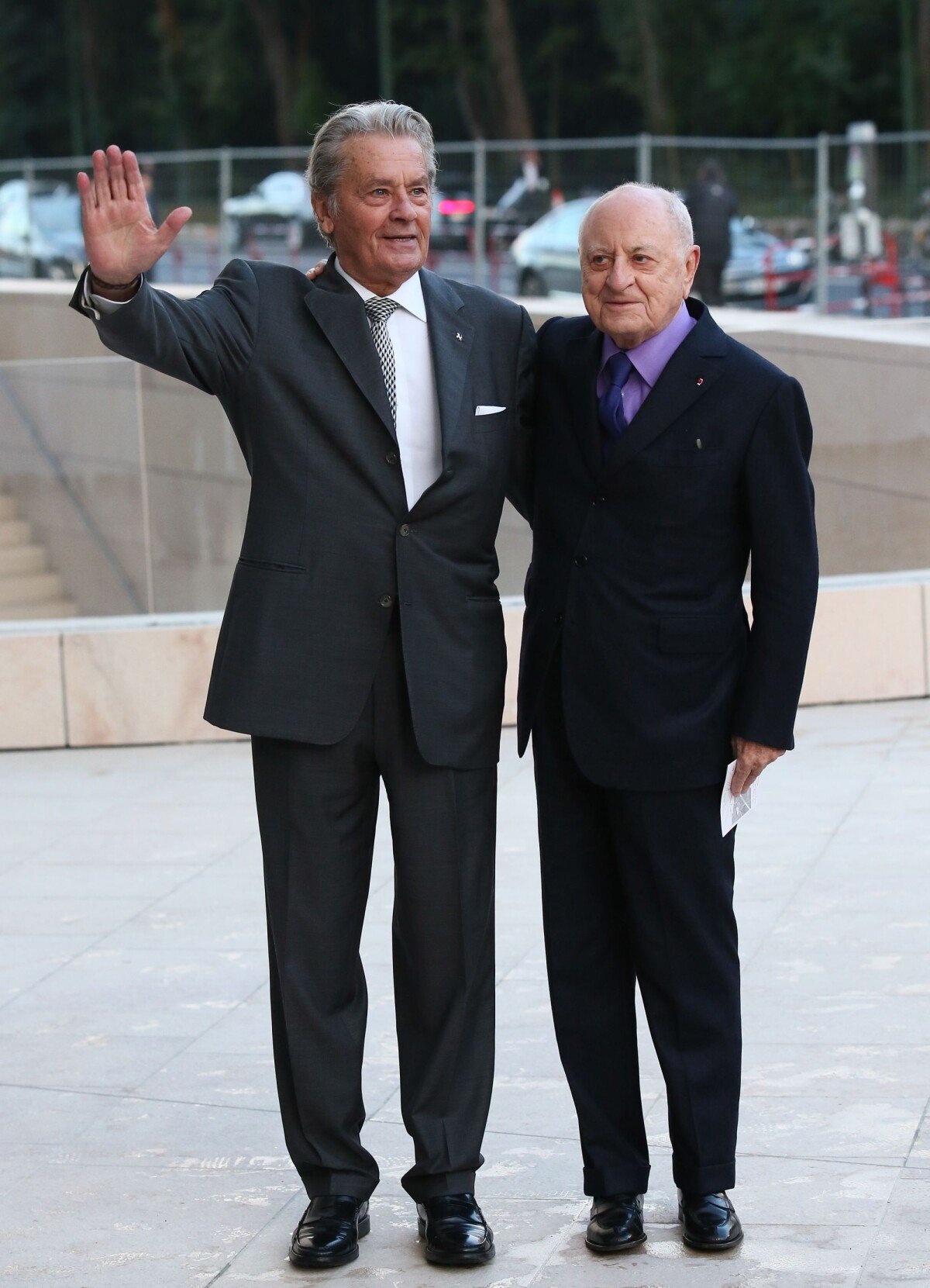 Alain Delon and Pierre Berge arriving at the Louis Vuitton art