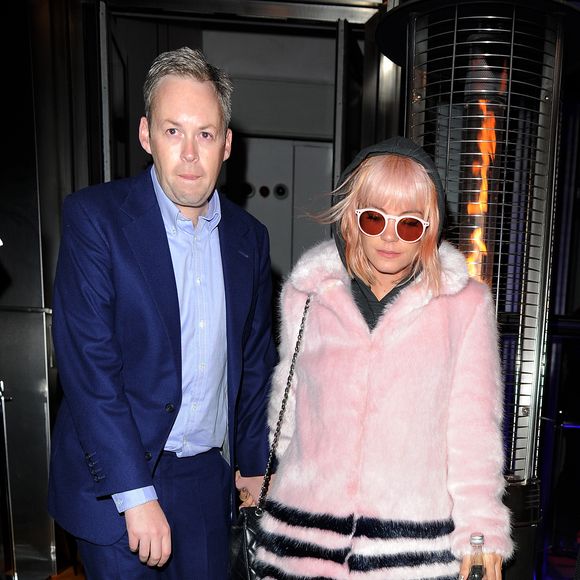 Lily Allen et son mari Sam Cooper sortent de la soirée des deux ans de "SushiSamba" où la chanteuse a donné un mini-concert à Londres, le 11 novembre 2014.