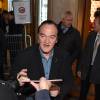 Quentin Tarantino - Les stars du film "Les 8 Salopards" signent des autographes devant le Grand Rex à Paris le 11 décembre 2015