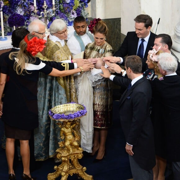 La princesse Madeleine de Suède et son mari Christopher O'Neill lors du baptême de leur fils le prince Nicolas de Suède à Stockholm, le 11 octobre 2015