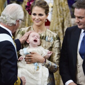 La princesse Madeleine de Suède et son mari Christopher O'Neill lors du baptême de leur fils le prince Nicolas de Suède à Stockholm, le 11 octobre 2015