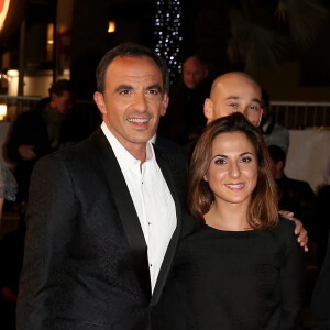 Nikos Aliagas et sa soeur Maria, à Cannes, le 13 décembre 2014.