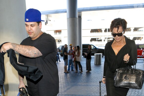 Rob Kardashian et Kris Jenner à l'aéroport de Los Angeles, le 18 mai 2014