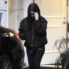 Kourtney Kardashian se promène dans les rues de Beverly Hills. Elle porte un blouson de la marque 'Yeezus' de Kanye West. Le 5 janvier 2015