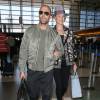 Rosie Huntington-Whiteley et Jason Statham arrivent à l'aéroport LAX de Los Angeles pour prendre un avion. Le 23 juillet 2015