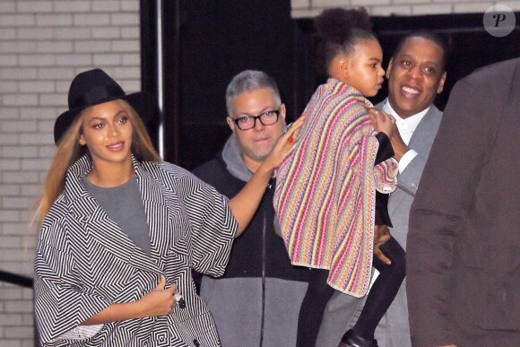 Beyoncé et Jay-Z, avec leur fille Blue Ivy Carter à New York, le 7 décembre 2014