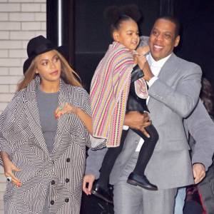 Beyoncé et Jay-Z, avec leur fille Blue Ivy Carter à New York, le 7 décembre 2014