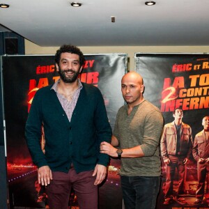 Eric Judor et Ramzy Bédia assistent à la première du film La Tour 2 Contrôle Infernale, à Paris, le 1er Février.