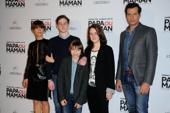 Marina Fois, Laurent Lafitte et les enfants à la première de Papa ou Maman à Paris, le 26 janvier 2015.