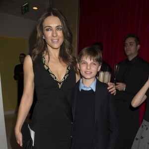 Elizabeth Hurley et son fils Damian - Personnalites apres la representation de "Casse-Noisette" par le ballet national britannique a Londres. Le 12 decembre 2013