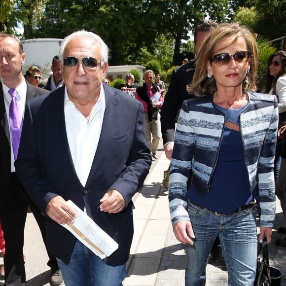 Dominique Strauss Kahn et sa compagne Myriam L'Aouffir aux Internationaux de France de tennis de Roland Garros le 30 mai 2015.