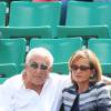 Dominique Strauss Kahn et sa compagne Myriam L'Aouffir dans les tribunes des Internationaux de France de tennis de Roland Garros le 30 mai 2015.