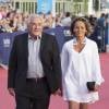 Dominique Strauss-Kahn et sa compagne Myriam L'Aouffir - Avant-première du film "Sin City" lors du 40ème festival du cinéma américain de Deauville, le 13 septembre 2014.