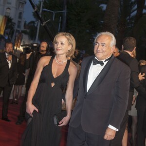 Dominique Strauss Kahn et sa compagne Myriam L'Aouffir sur le tapis rouge lors du 66eme festival du film de Cannes. Le 25 mai 2013