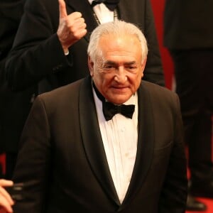 Dominique Strauss Kahn et sa compagne Myriam L'Aouffir sur le tapis rouge lors du 66eme festival du film de Cannes. Le 25 mai 2013