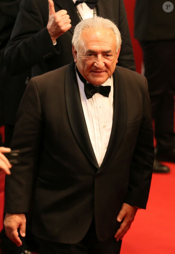 Dominique Strauss Kahn et sa compagne Myriam L'Aouffir sur le tapis rouge lors du 66eme festival du film de Cannes. Le 25 mai 2013